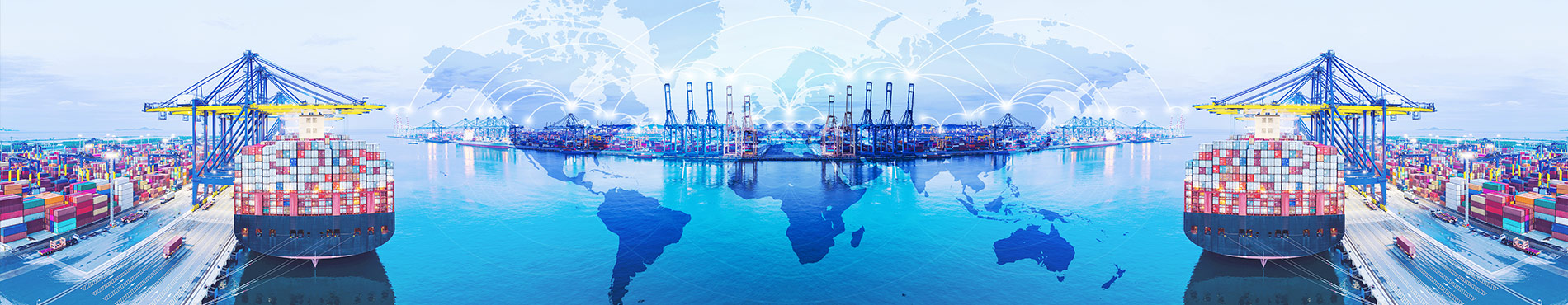 Blick nach oben: Glänzende Gebäude und grüne Blätter unter einem klaren Himmel, vermittelt Frische und Weite.