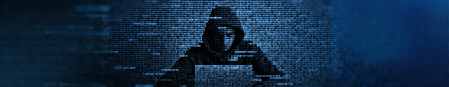 Hände tippen auf einer Tastatur, während ein Login-Screen mit Sicherheitsdetails angezeigt wird